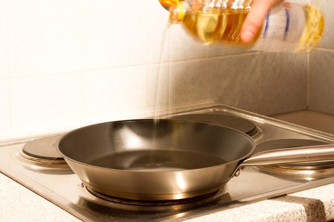 oil poured into skillet oil poured into skillet
